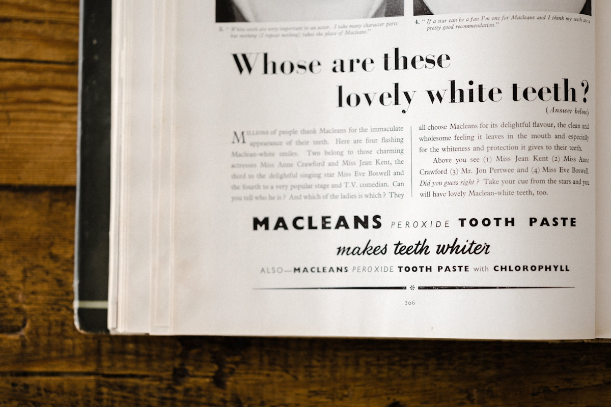 white printer paper on brown wooden table