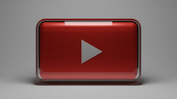 a red play button with a white arrow