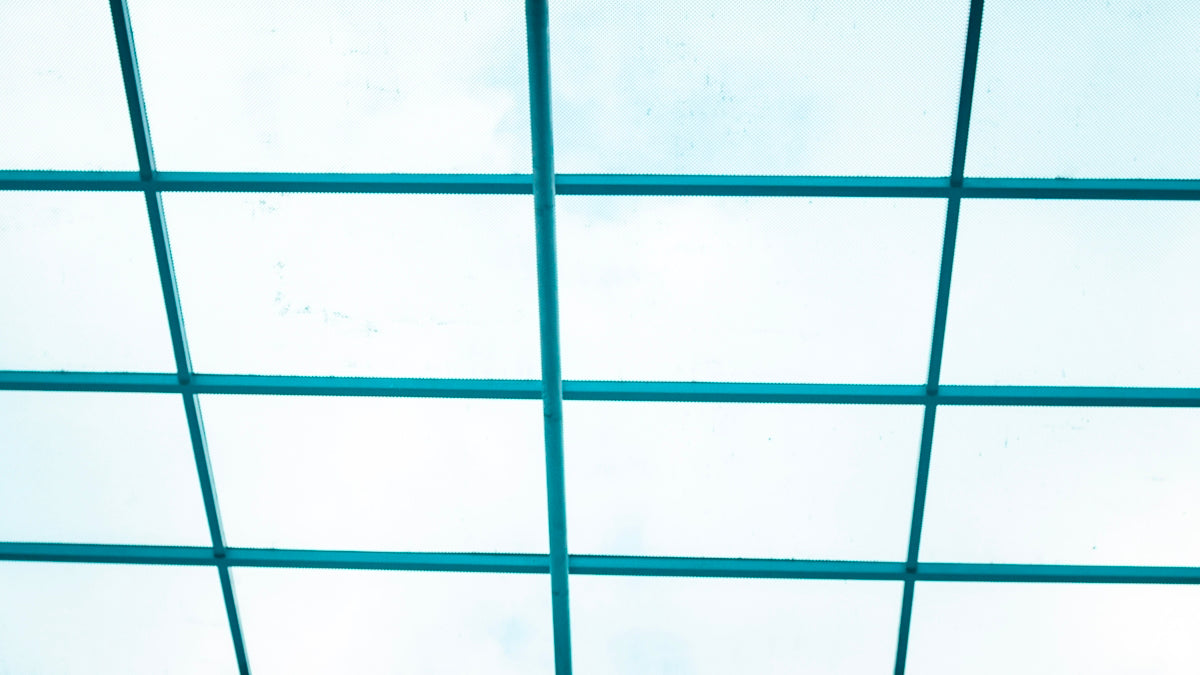 a close up of a ceiling with a sky background