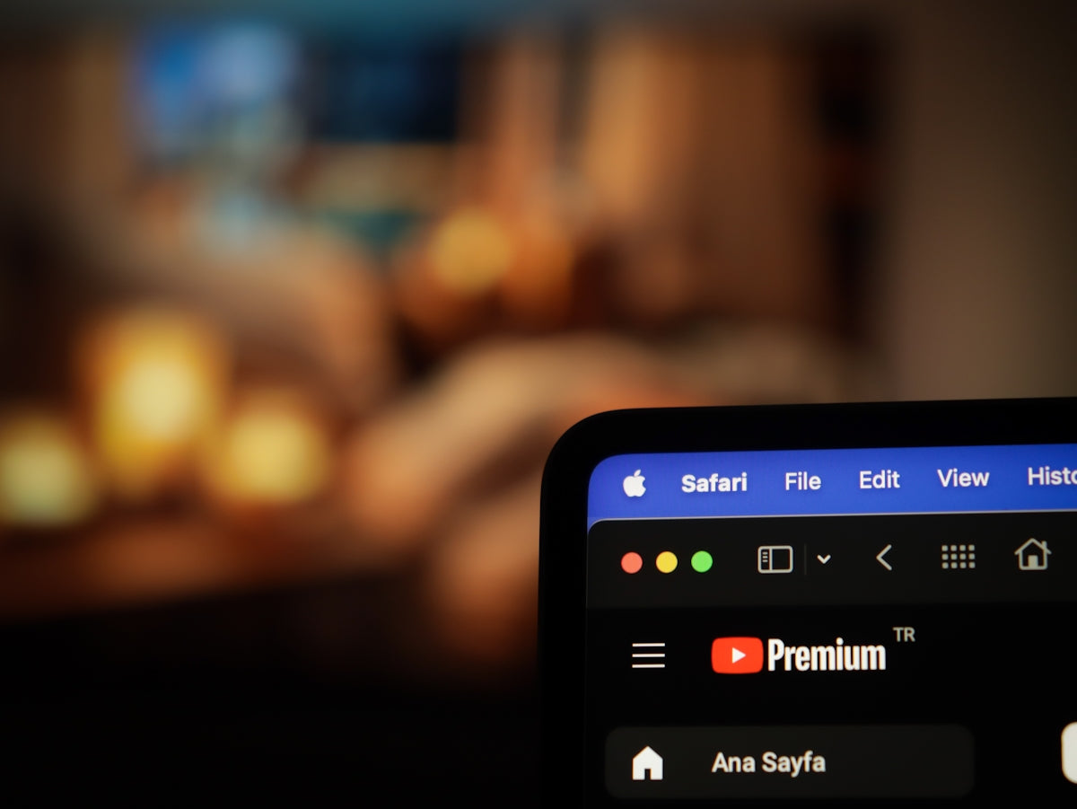 a close up of a remote control with a blurry background