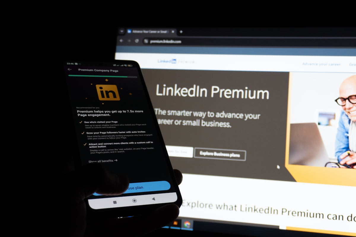 Linkedin premium displayed on phone and computer screen.