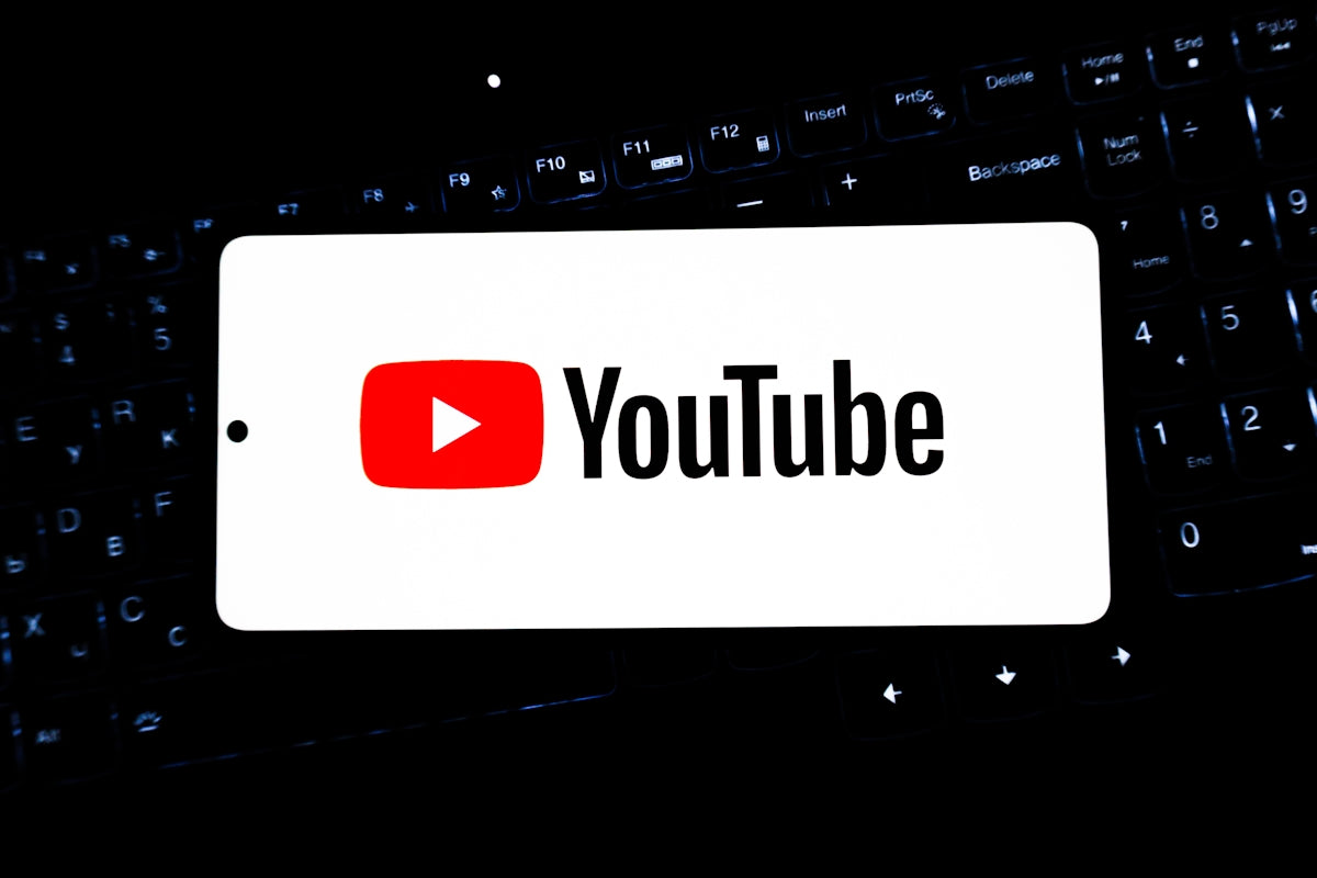 Youtube logo displayed on a smartphone screen.