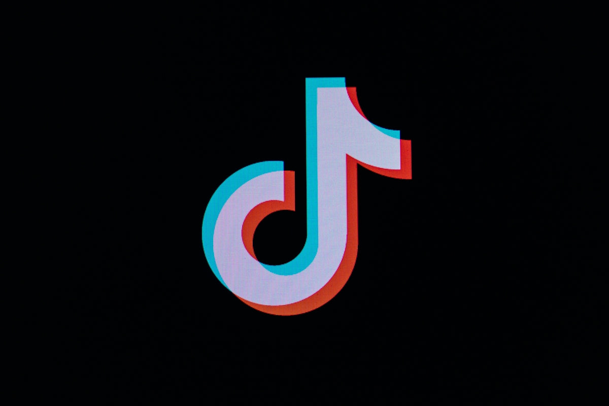 Tiktok logo with glitch effect on black background