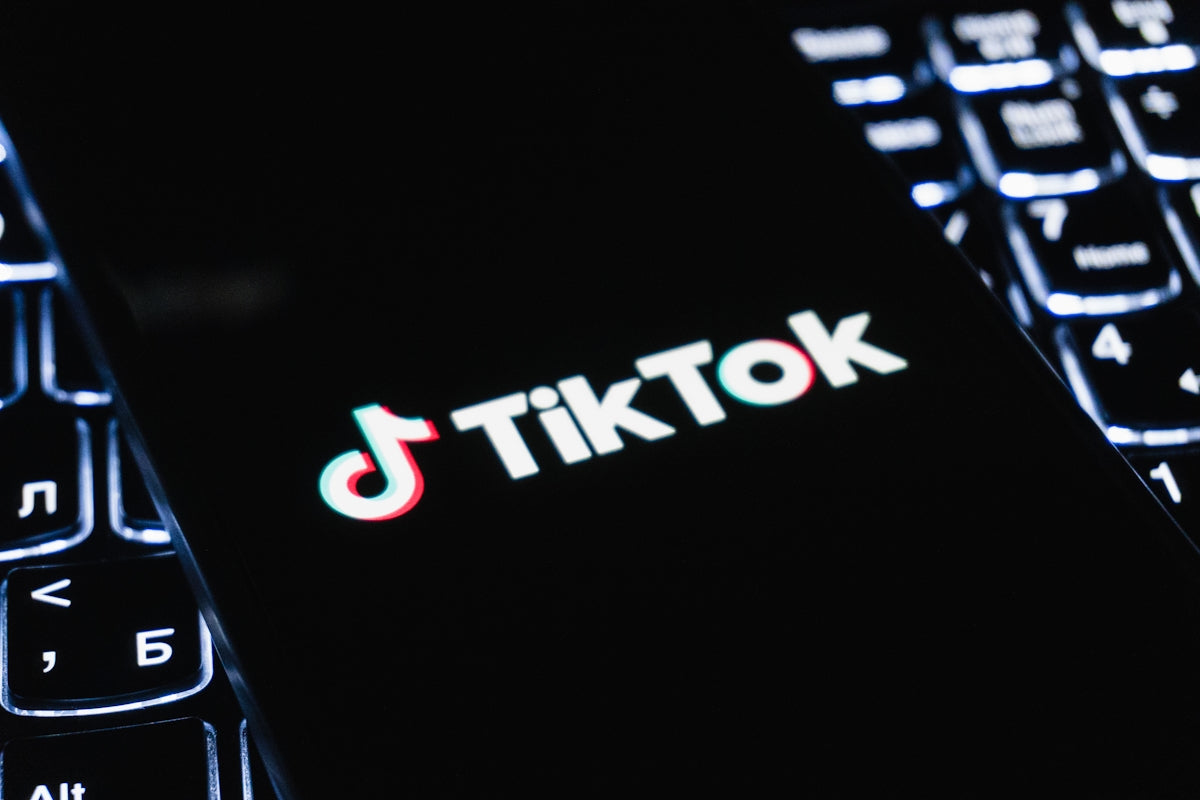 Tiktok logo displayed on a smartphone screen.