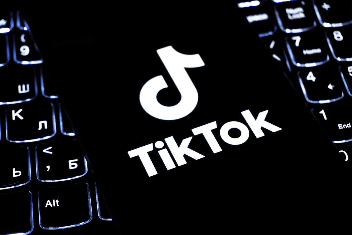 Tiktok logo on a backlit keyboard