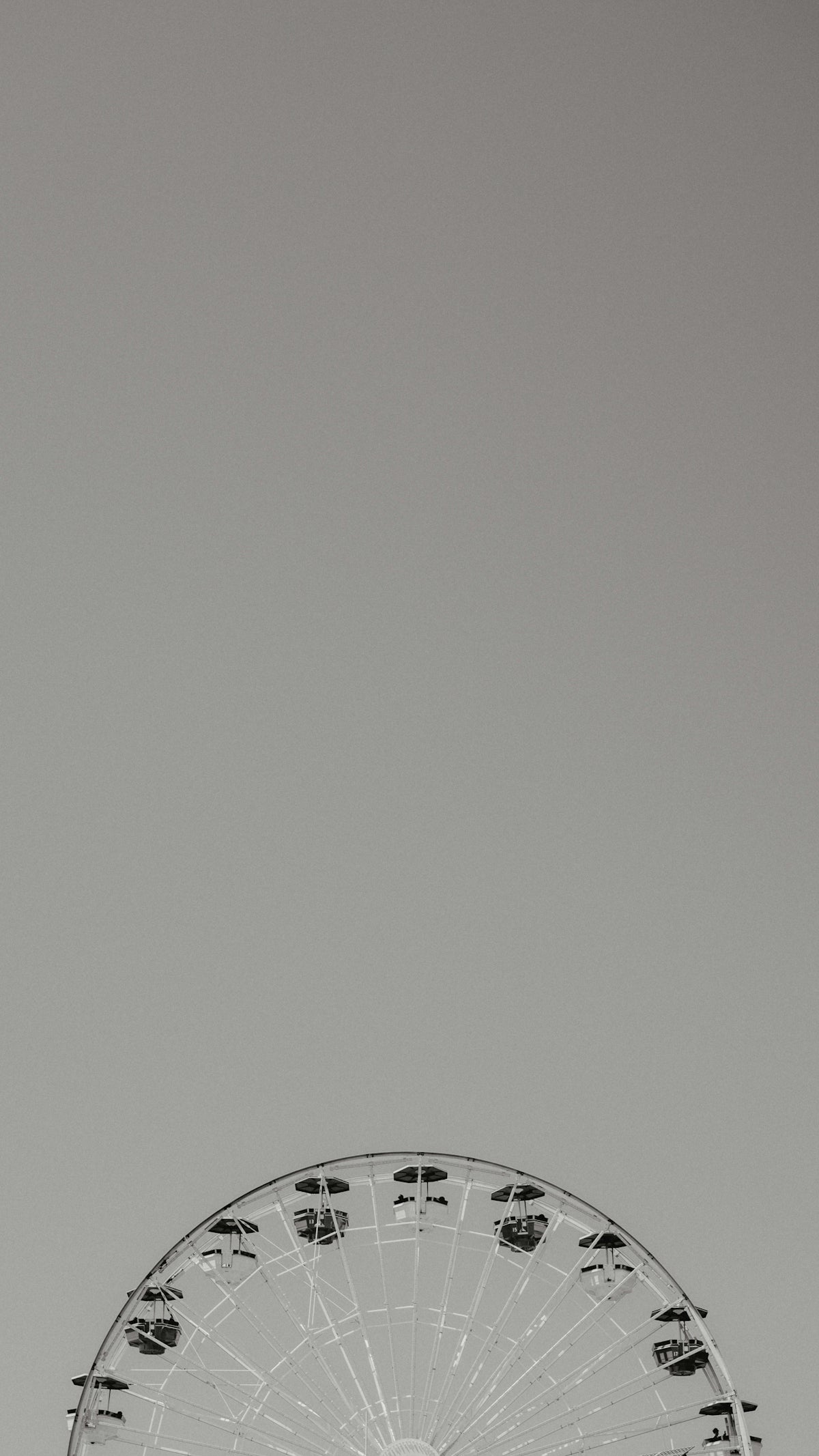 A ferris wheel against a clear sky