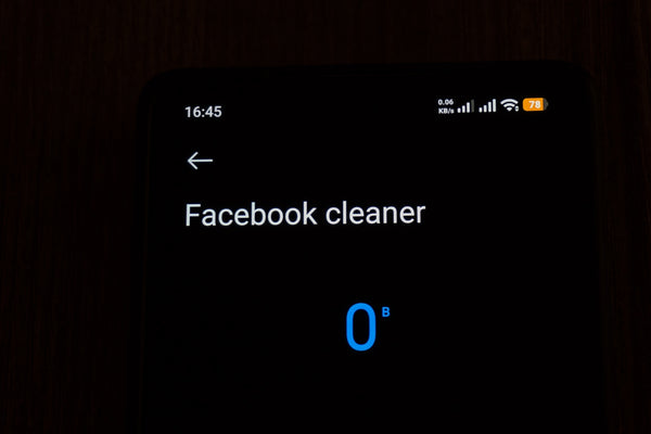 Smartphone screen shows facebook cleaner with zero items.