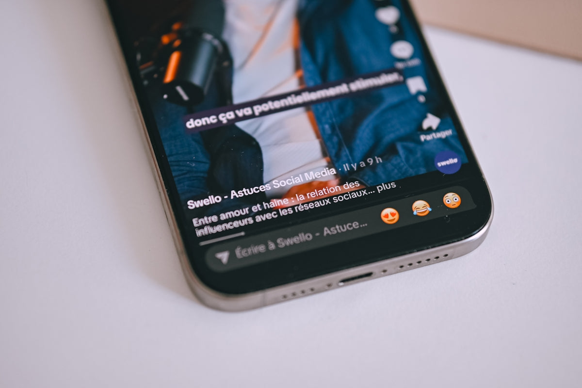 Smartphone displaying a social media video feed.